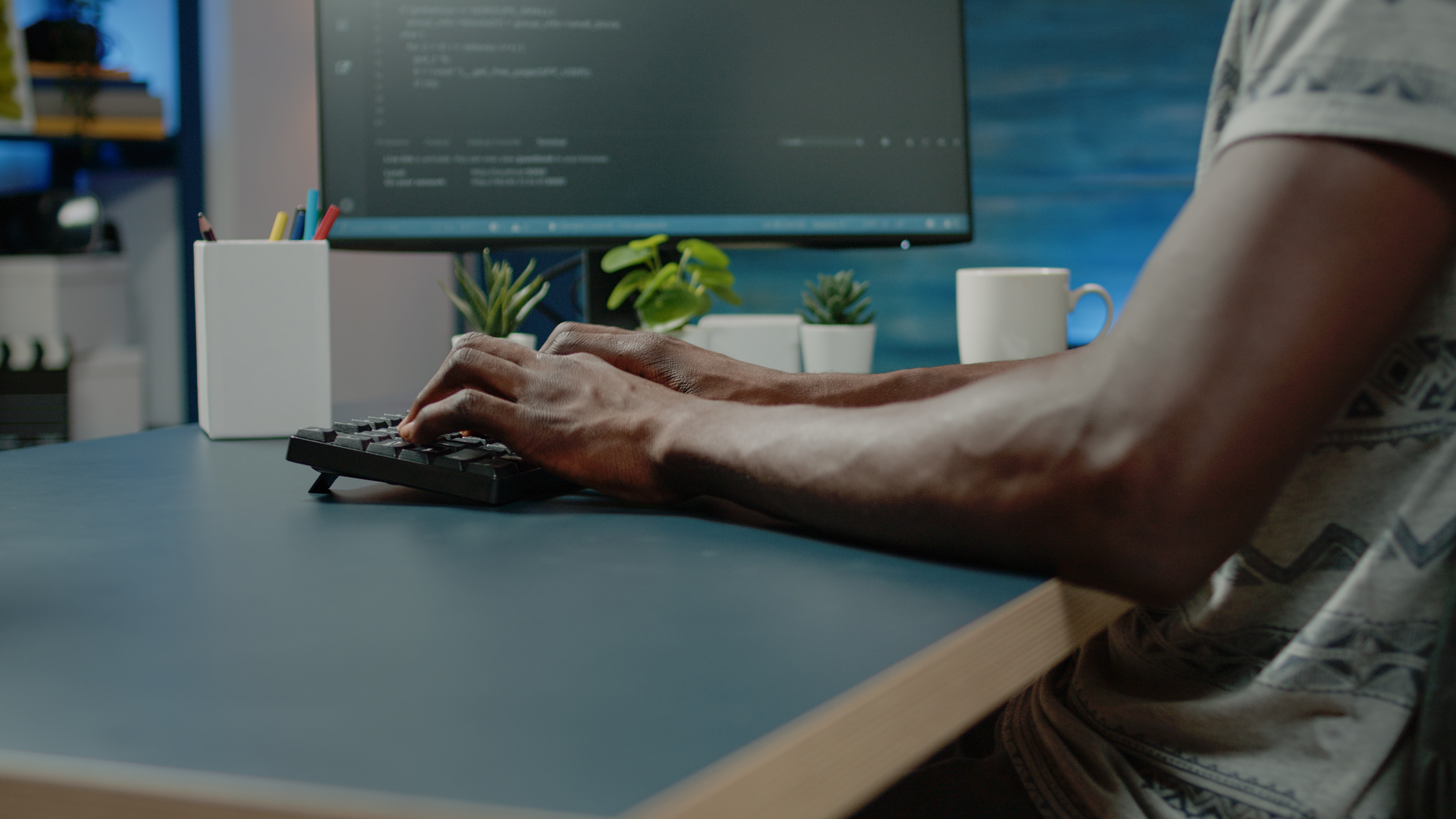 An EIA/EMP practitioner working at a desk